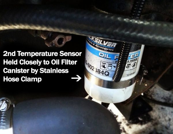 Temperature sensor shown attached to oil filter with stainless steel hose clamp